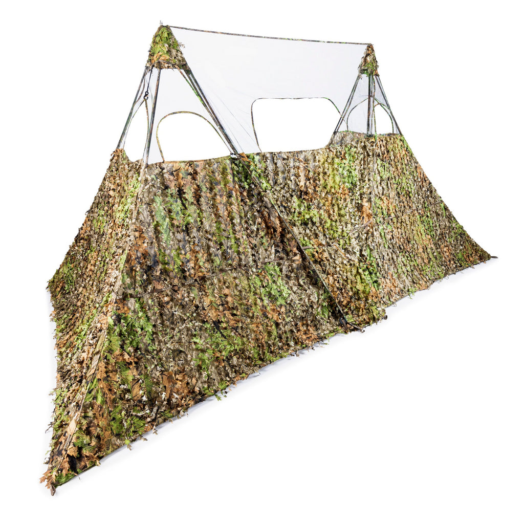 Camouflage hunting blind with leafy 3D pattern for deer and turkey hunting concealment