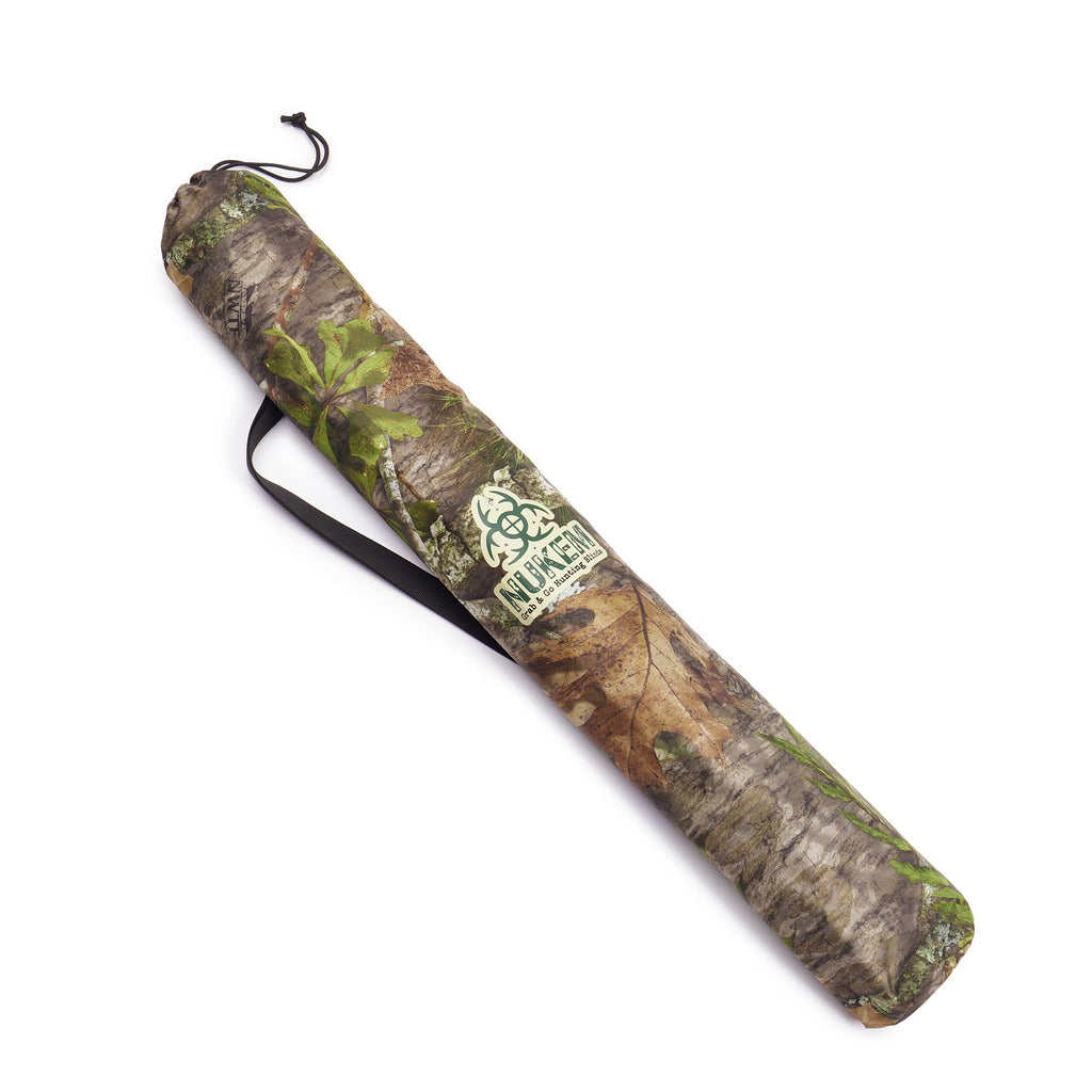 Mossy Oak camo hunting blind carry bag with drawstring closure and shoulder strap for portable outdoor use