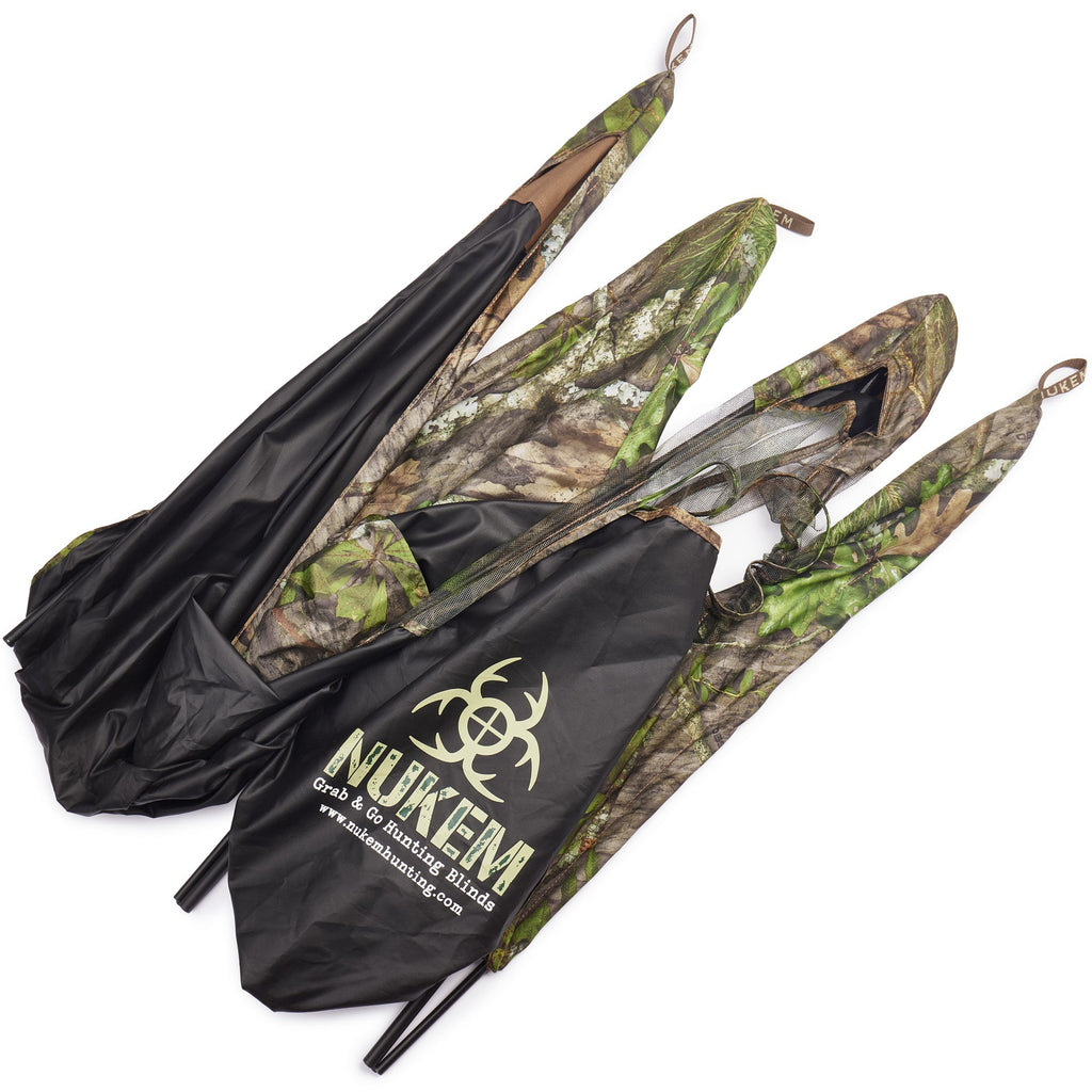 NUKEM Grab & Go Hunting Blind in leafy camo pattern with mesh windows and carry bag for portable deer hunting setup