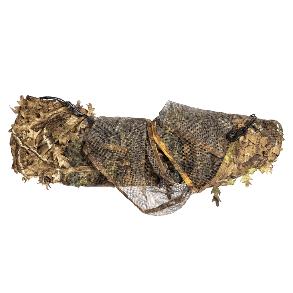 Leafy camouflage ghillie suit for hunting, blending with woodland terrain using 3D foliage and mesh