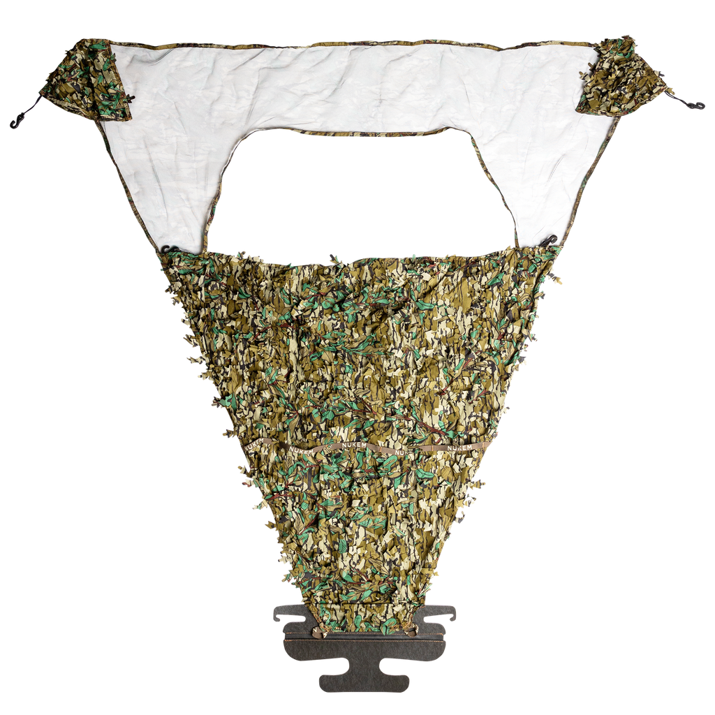 Camo hunting blind mesh with leafy pattern for concealment in outdoor settings