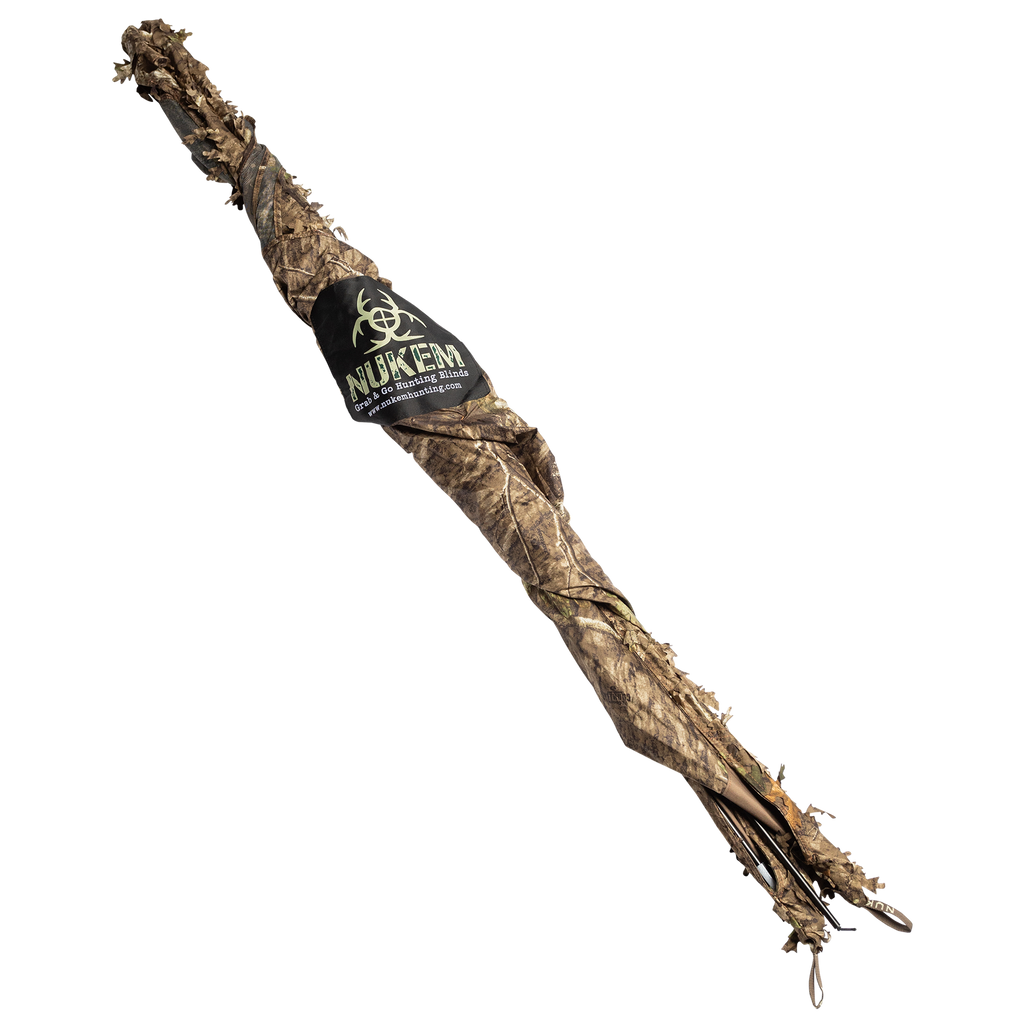 Nukem Grab & Go Hunting Blind in leafy camo pattern, portable and compact for outdoor hunting use