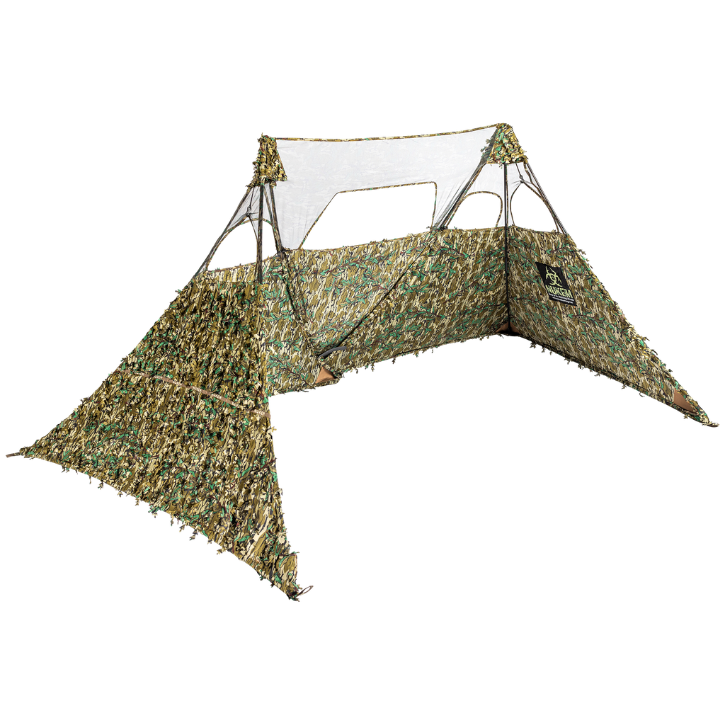 Camo hunting blind with leafy pattern and mesh windows for outdoor concealment and observation