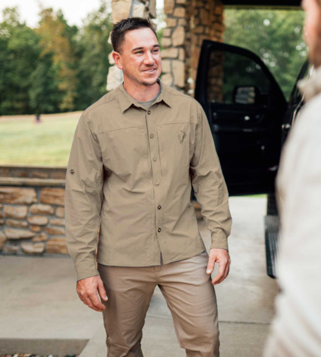 Tan long sleeve hunting shirt with button front and chest pockets, ideal for outdoor adventures