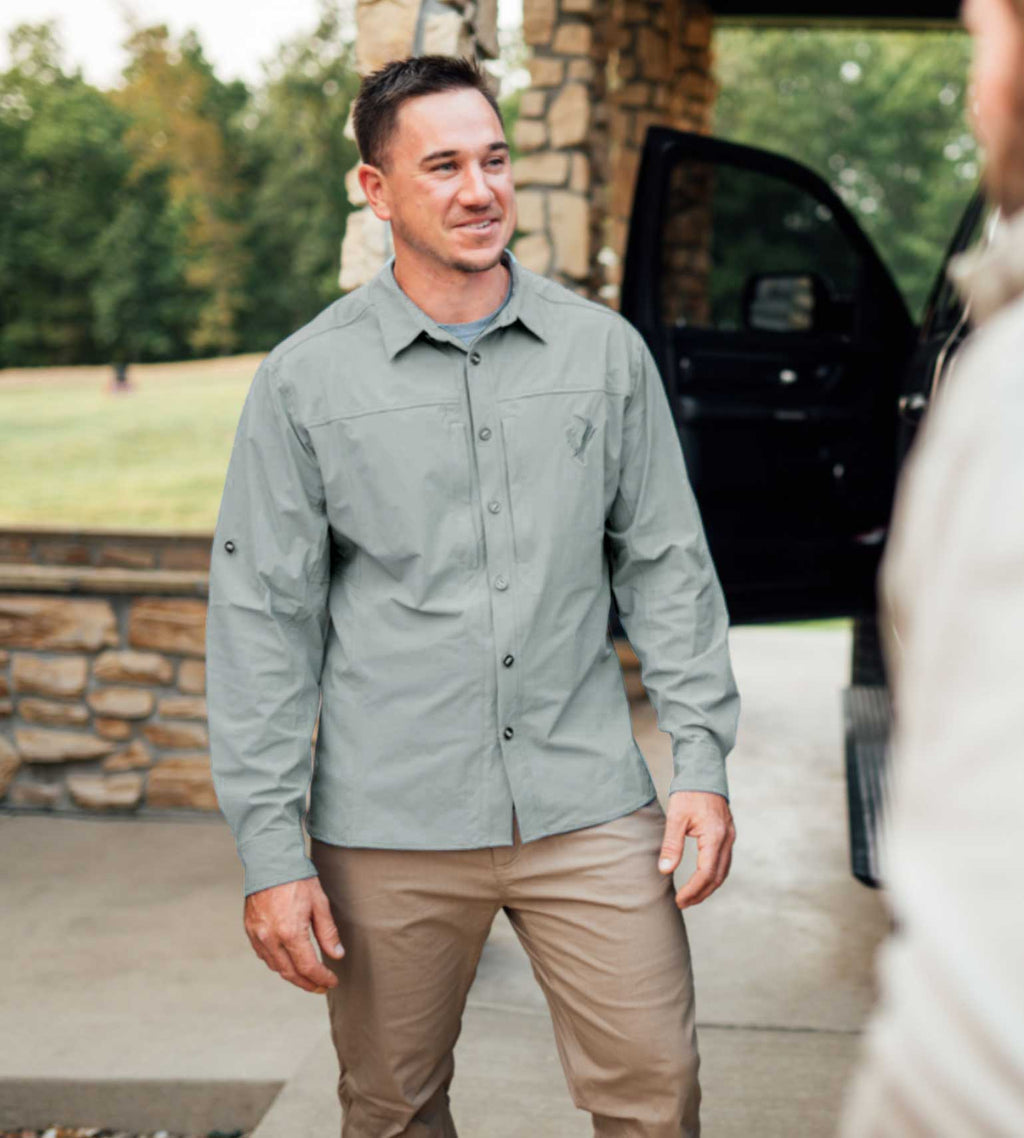 Men's olive long sleeve hunting shirt with button front and chest pockets, ideal for outdoor adventures