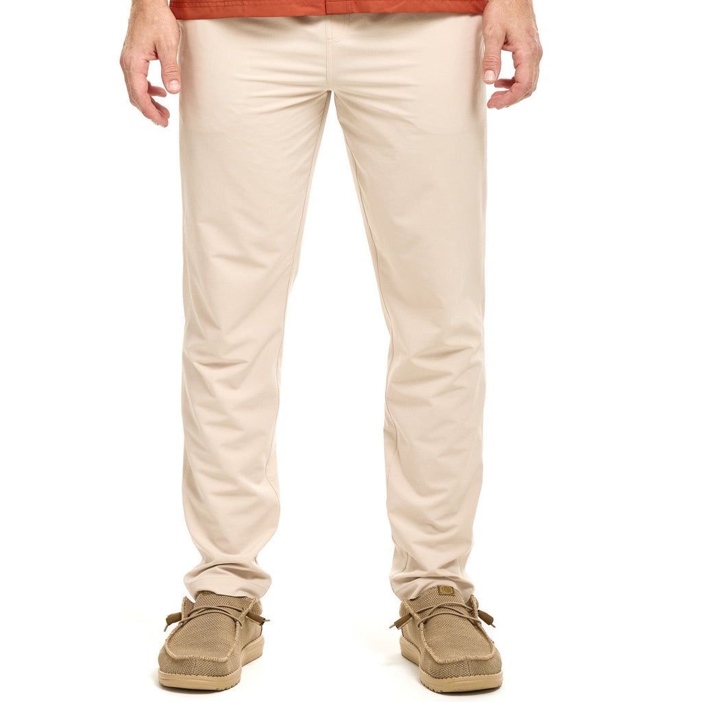 Tan hunting pants for outdoor adventures, durable fabric, slim fit, paired with matching boat shoes