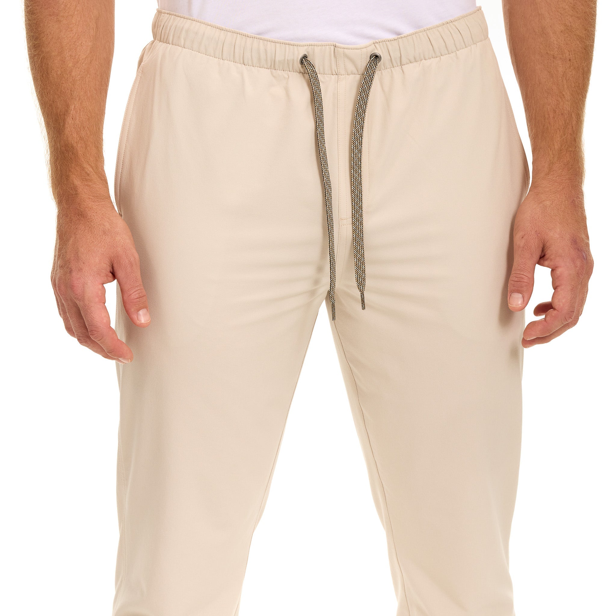 Beige drawstring hunting pants with elastic waist, lightweight outdoor wear for hiking or field use