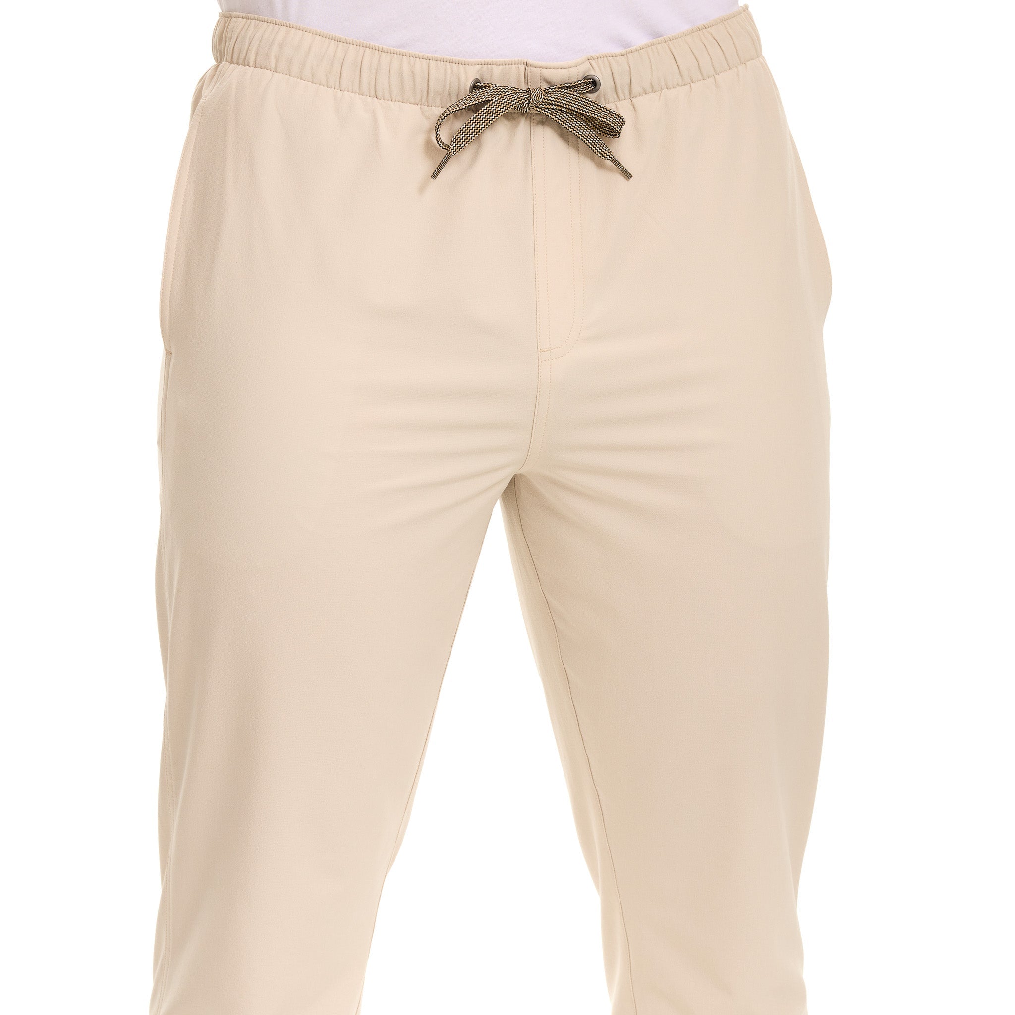 Tan drawstring hunting pants with elastic waist, ideal for outdoor adventures and field use