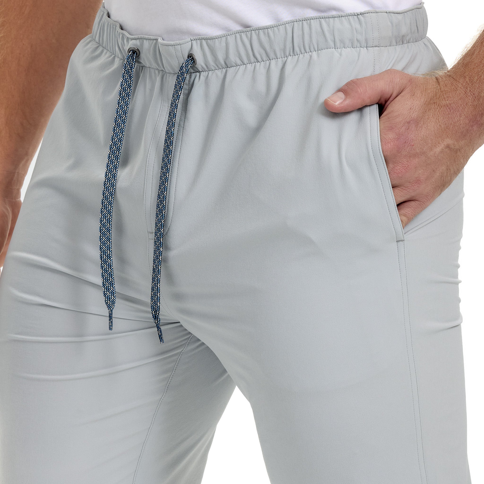 Light gray outdoor joggers with blue drawstring, elastic waist, and side pockets for hunting or casual wear