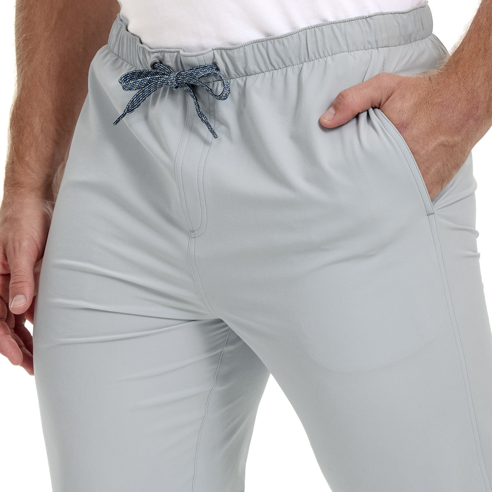Light gray drawstring pants with blue rope tie, elastic waist, and side pocket for outdoor use