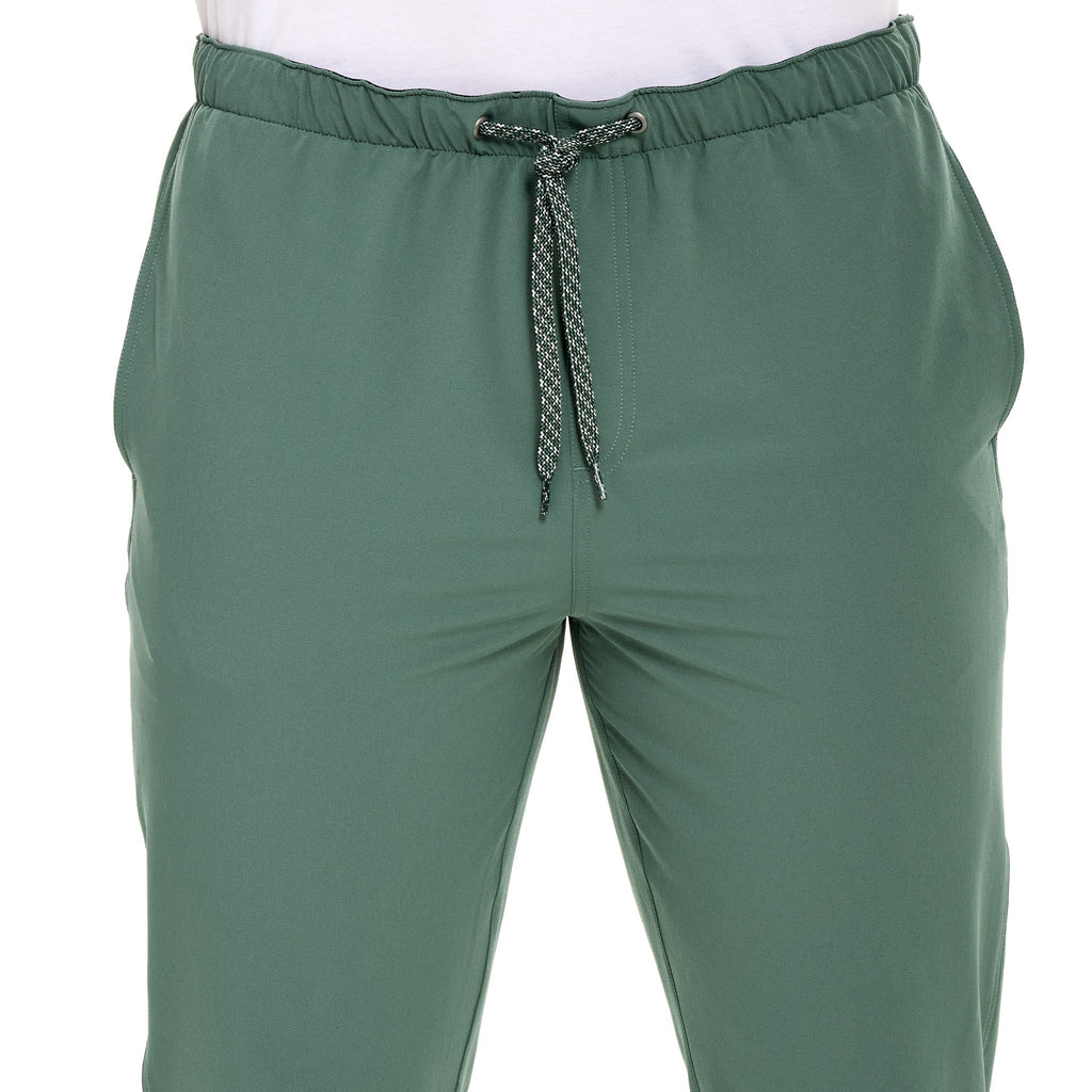Olive green drawstring hunting pants with elastic waist, ideal for outdoor adventures and field use.