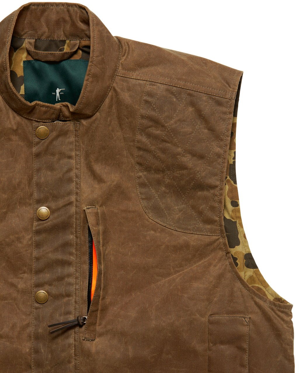Zippered weather shield chest pocket on the Dark Oak Upland Vest