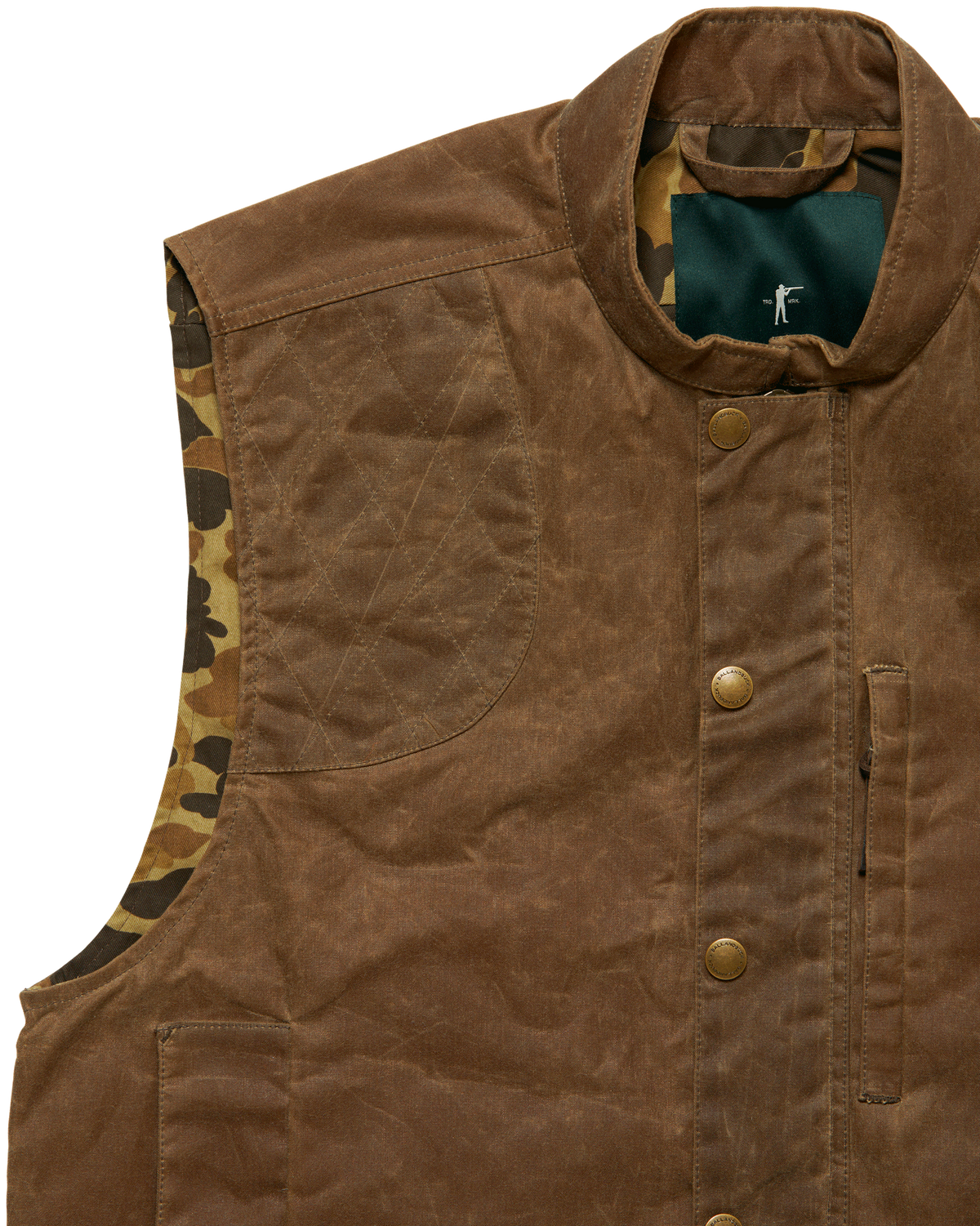 Side view of the Dark Oak Upland Vest showing camo lining at the armhole