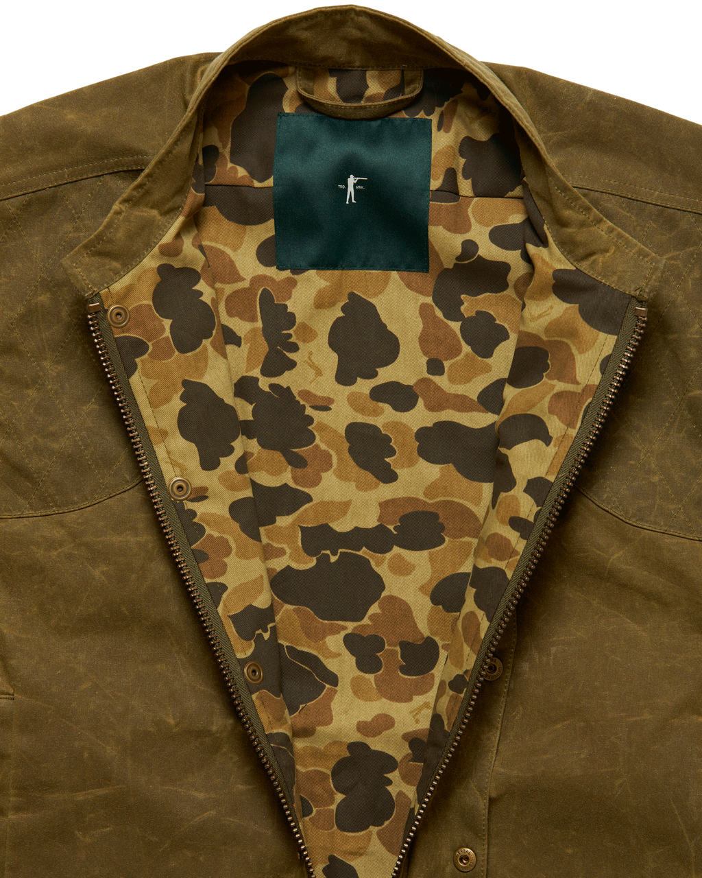 Olive Upland Vest opened to show the Original Camo lining