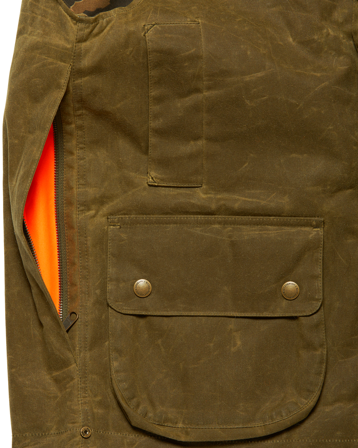 Side-access game pocket with blaze orange liner on the Olive Upland Vest