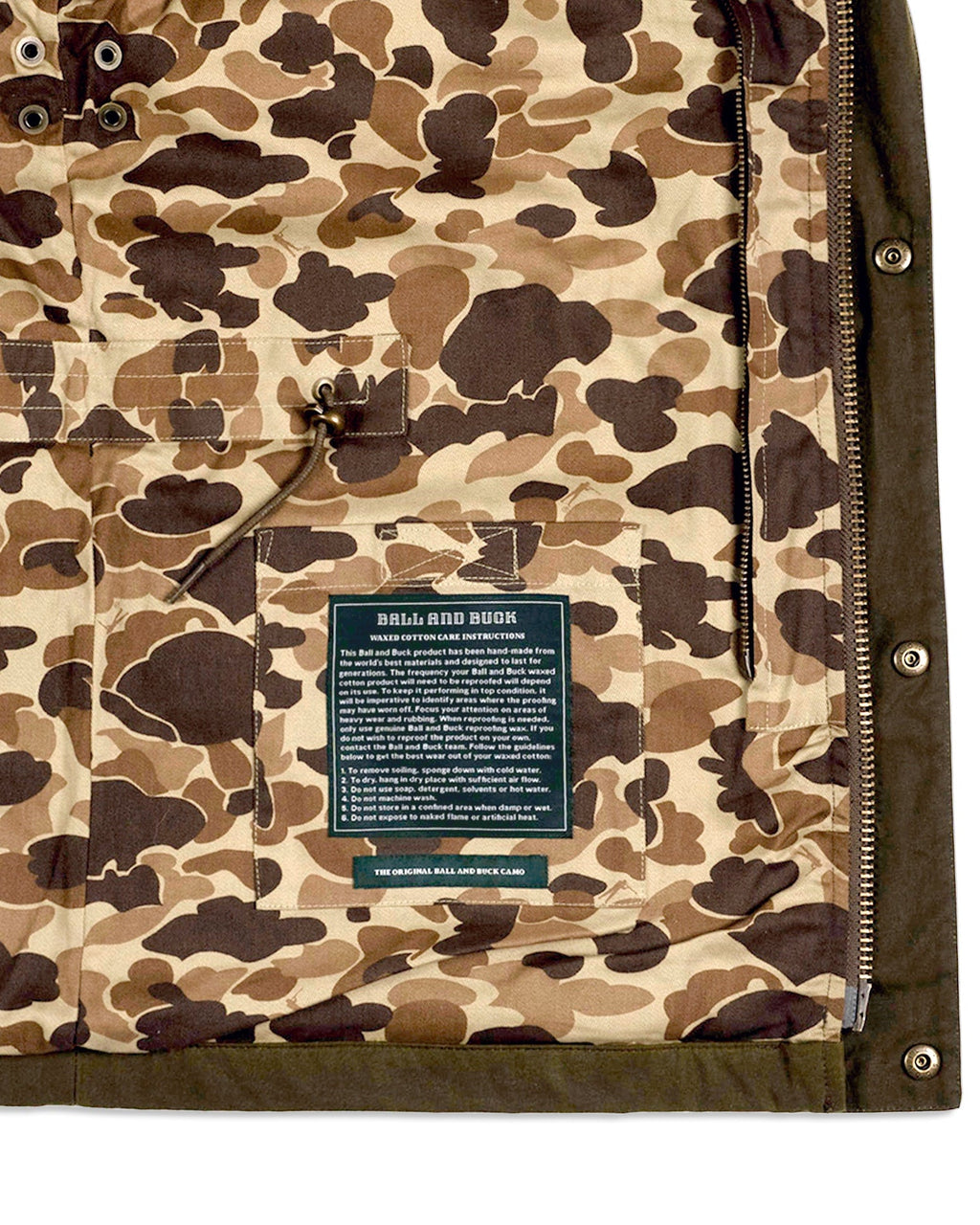 Original Camo lining with interior pocket, left side of the Waxed Field Jacket