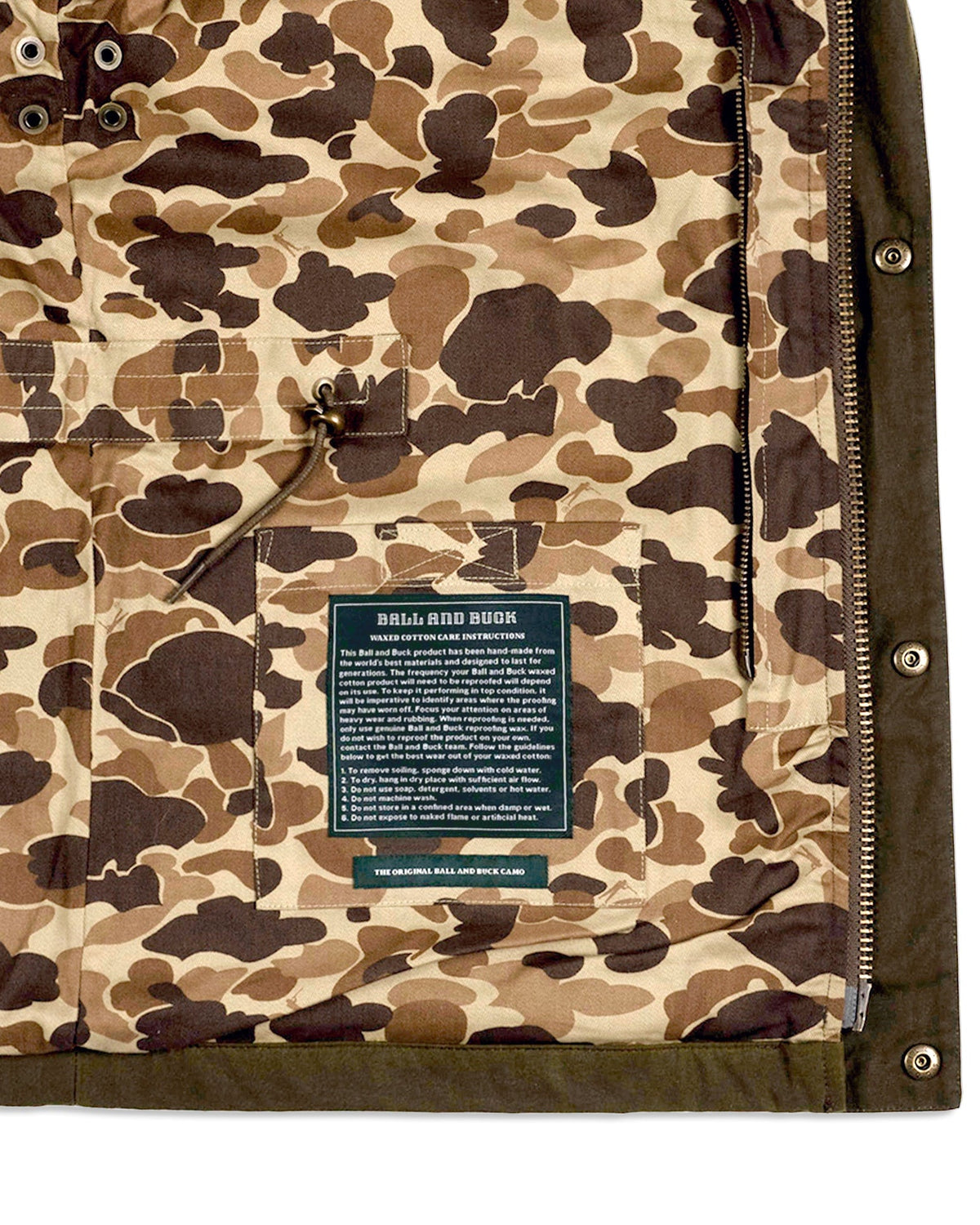 Original Camo lining with interior pocket, left side of the Waxed Field Jacket