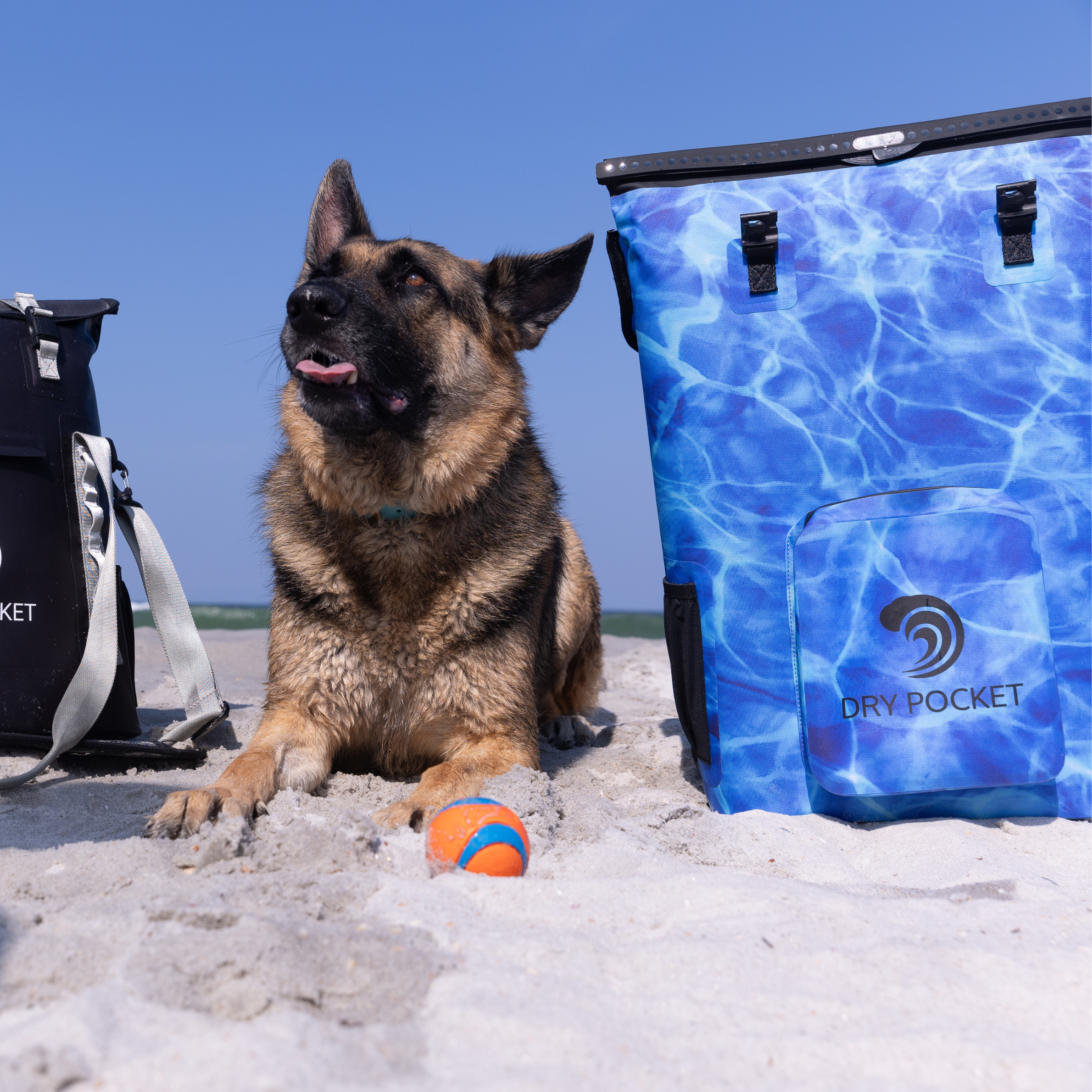 Blue water-pattern dry bag with Dry Pocket logo, beach gear for outdoor adventures