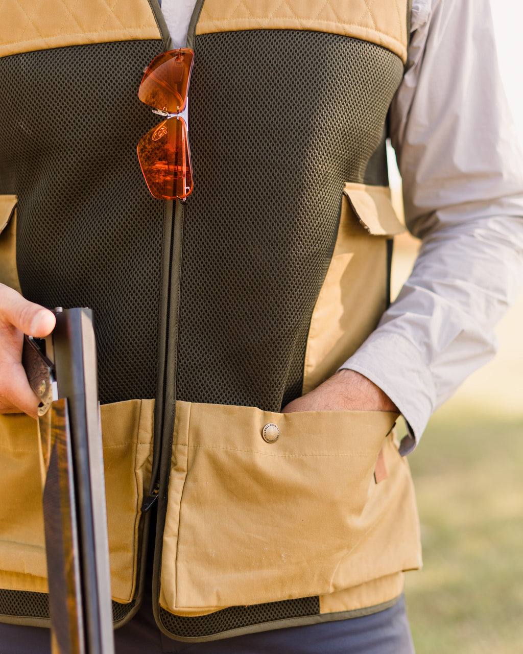Towel ring and twill loop at the hem of the Heritage Clays Vest, worn