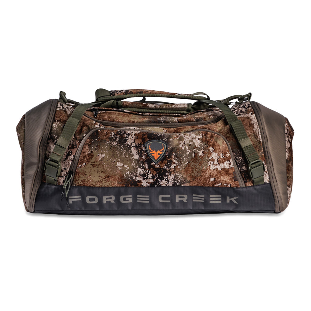 Forge Creek camo duffel bag for hunting gear, rugged outdoor carry with shoulder straps and logo patch