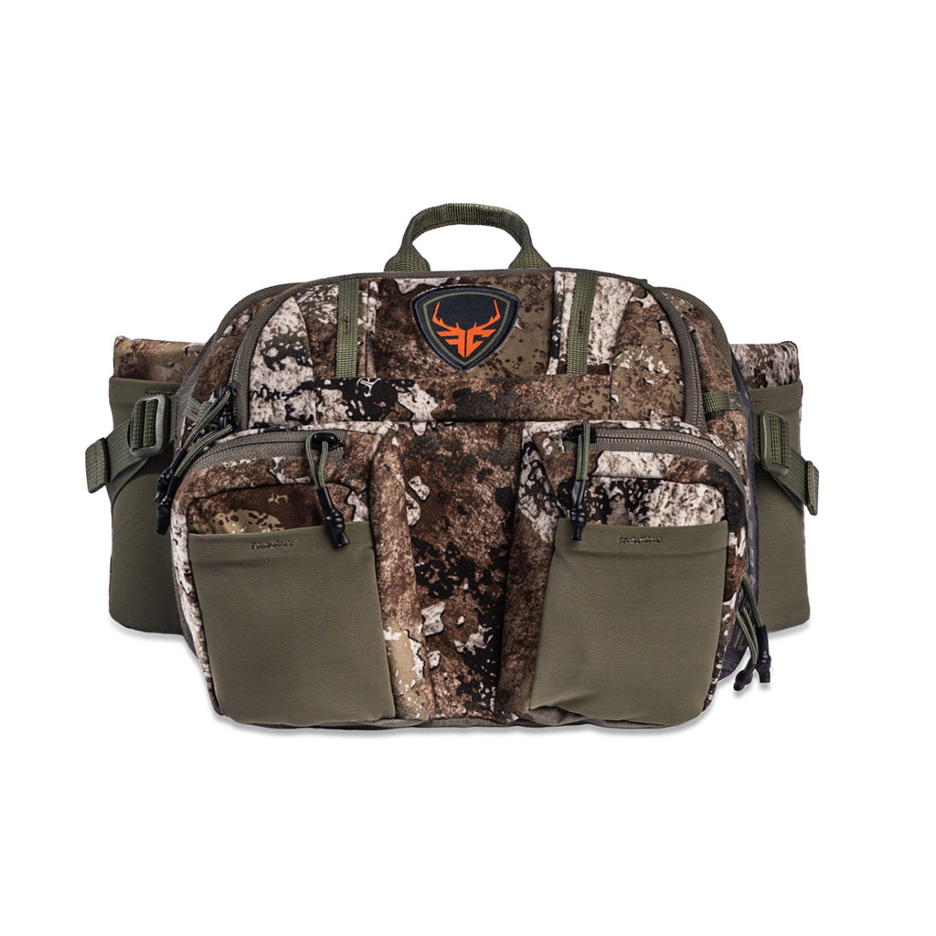Camo hunting waist pack with multiple pockets, olive straps, and deer logo patch for outdoor gear storage