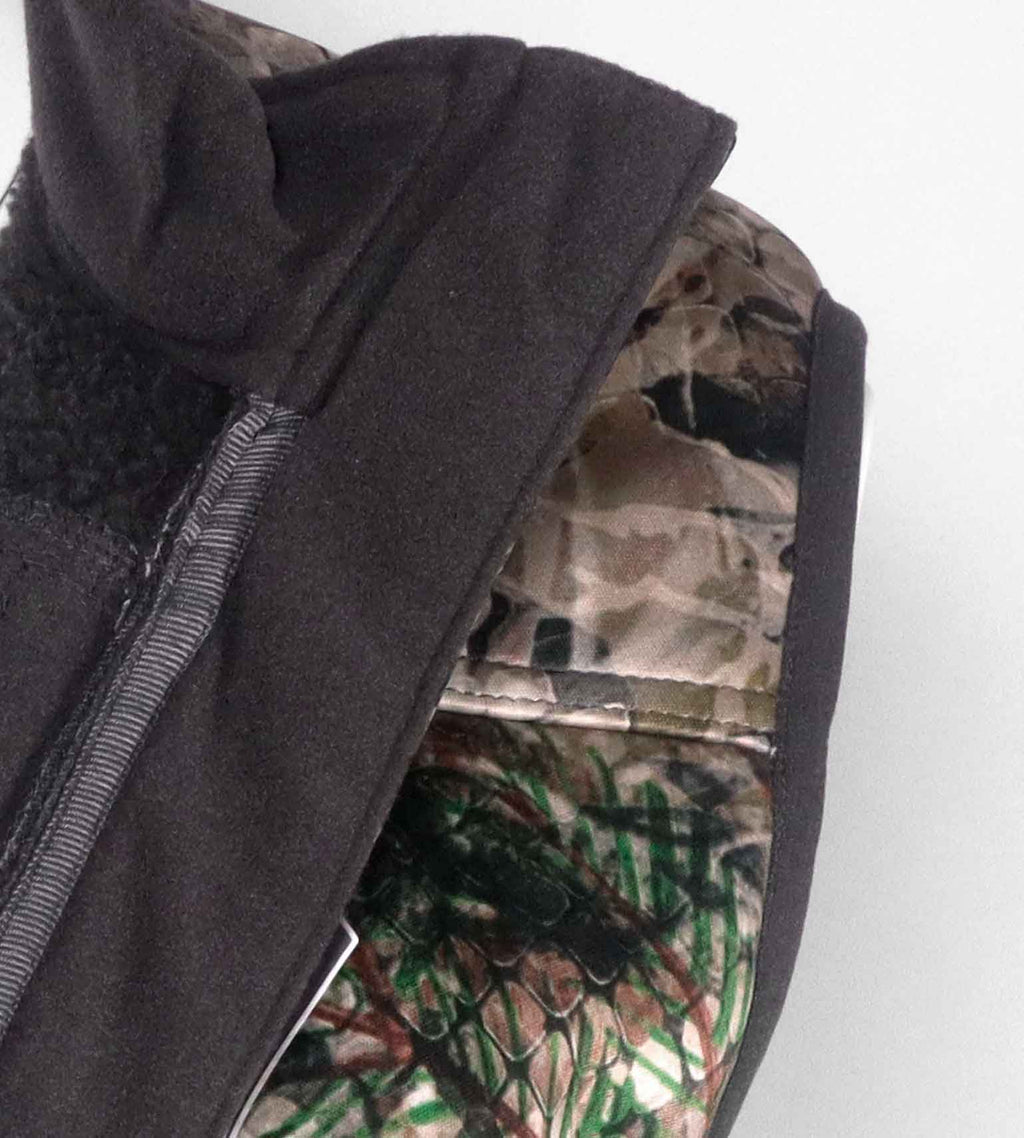 Close-up of the black fleece collar and shoulder on the Vycah Kinsley Vest in Fall camo