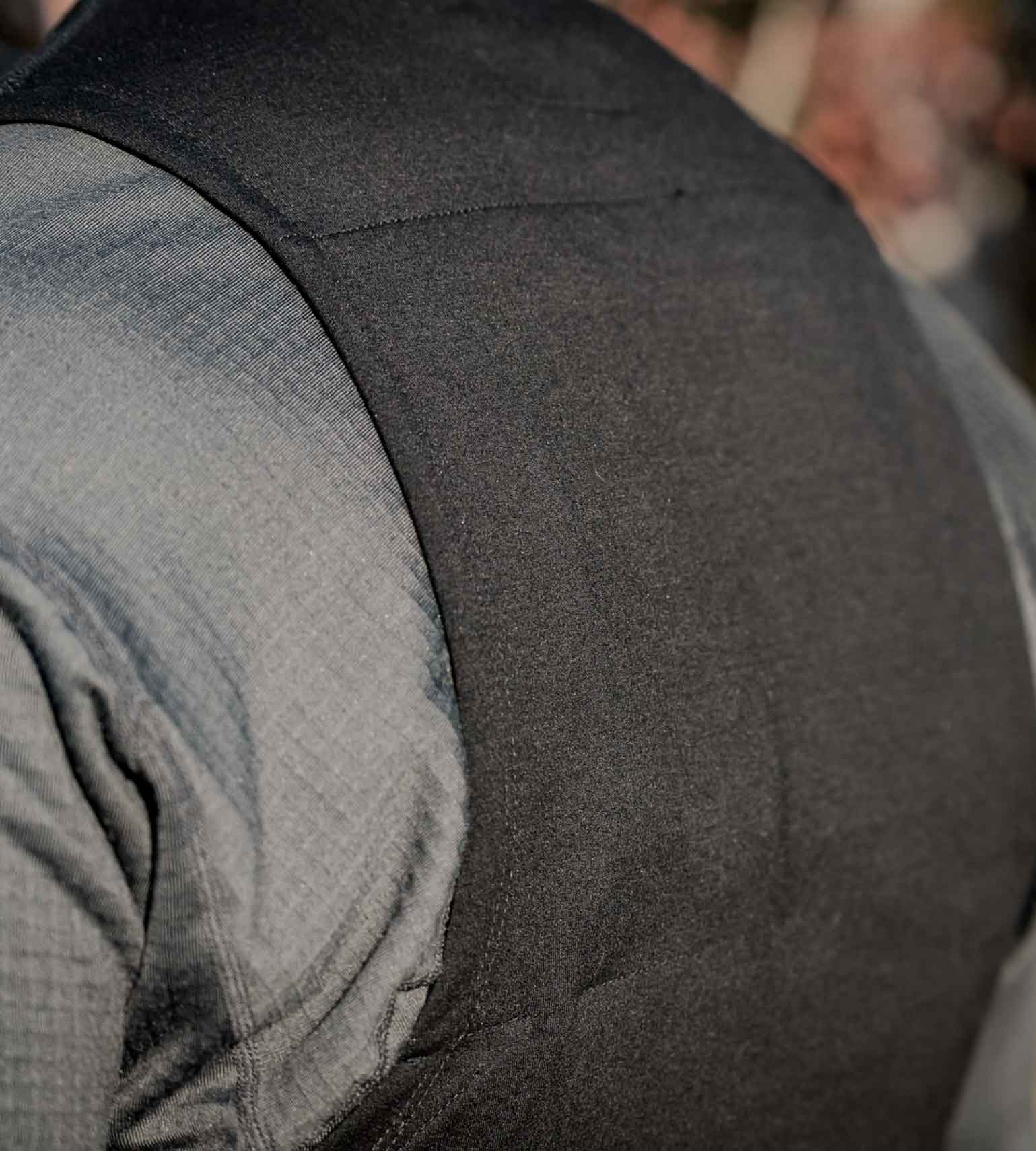 Close-up of the shoulder and fabric texture on the Vycah Oculus Heated Vest