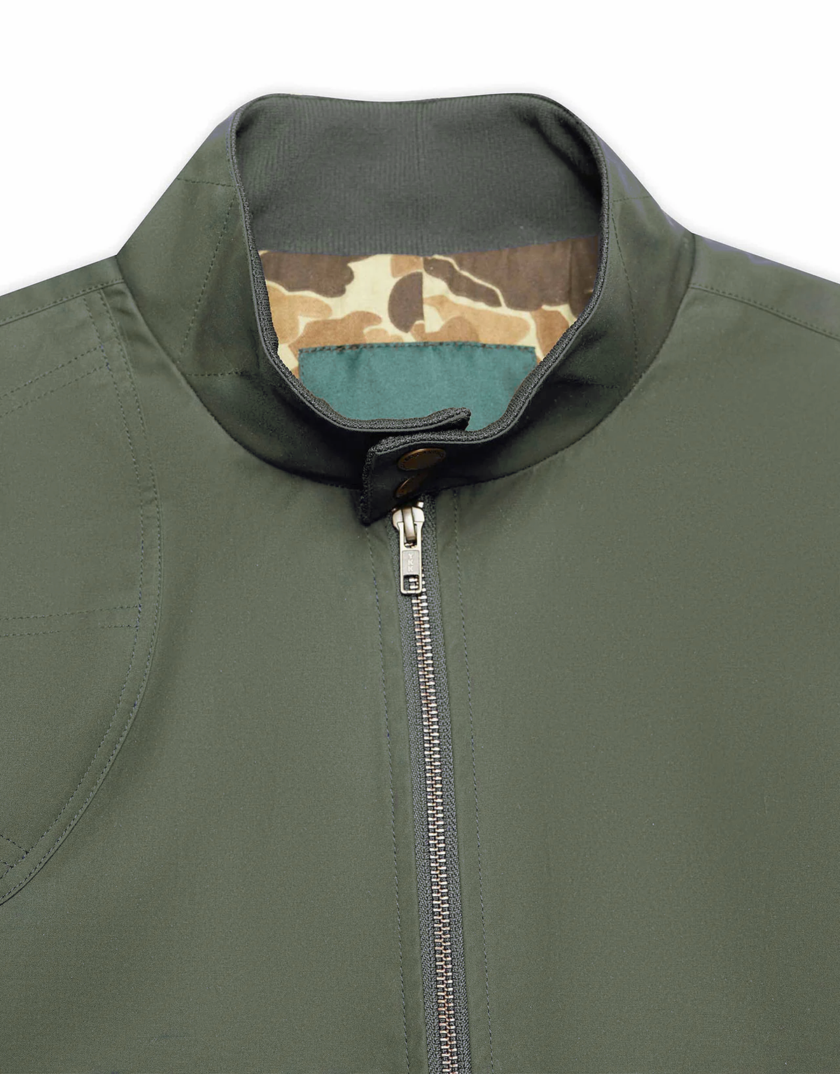 Standing collar with camo lining and zipper on the Sage Green Harrington Jacket