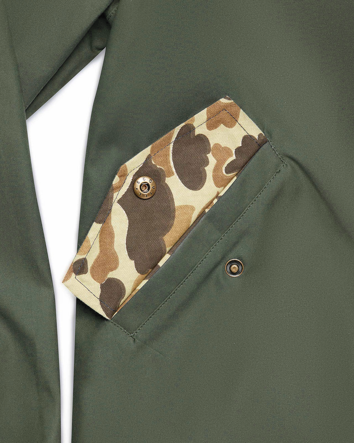 Original Camo lined pocket on the Sage Green Harrington Jacket