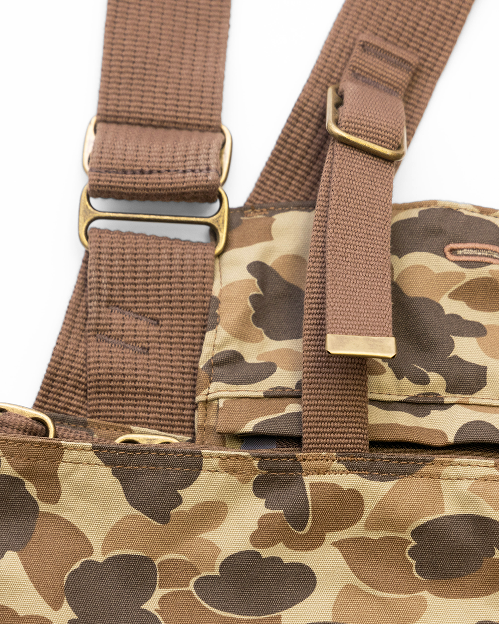 Cotton webbing straps and brass adjusters on the Original Camo Strap Vest