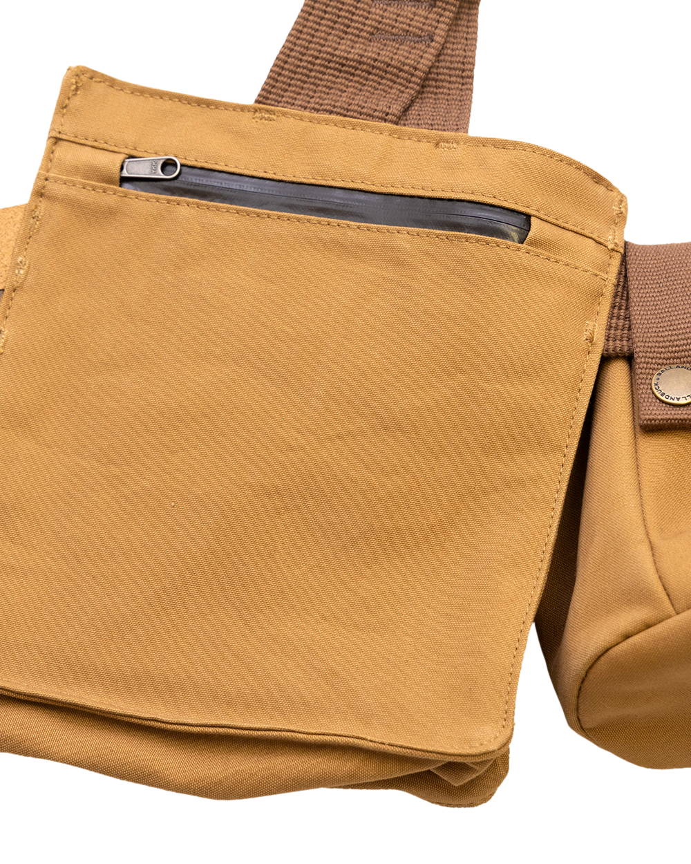 Zippered concealed phone pocket behind the front shell pocket on the Strap Vest