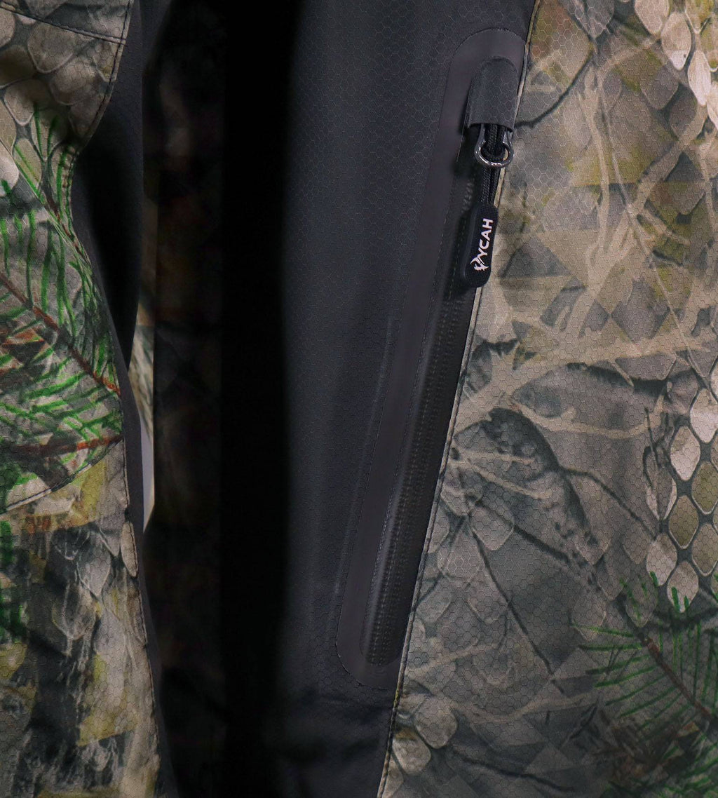 Close-up of a waterproof matte zipper with shed housing on the Vycah Ventral Rain Jacket