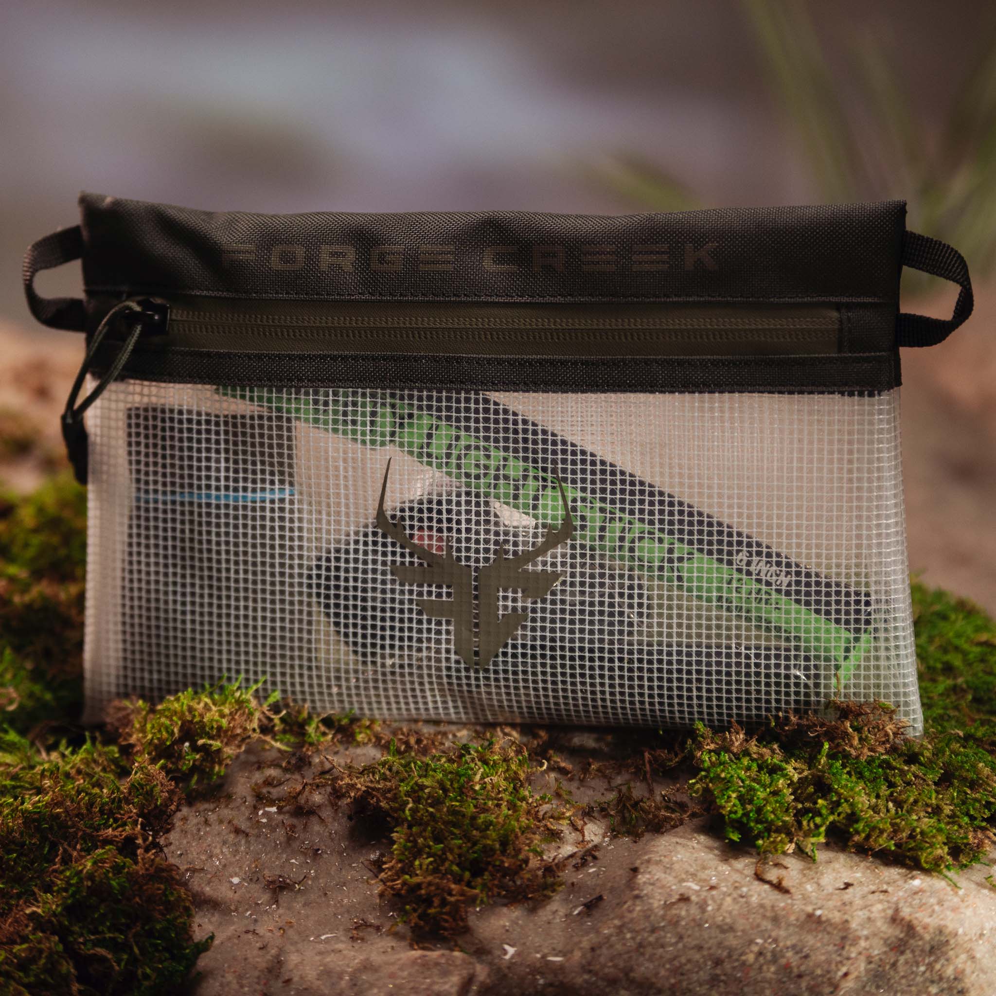 Mesh hunting gear pouch with deer logo, olive green zipper, for outdoor storage and organization